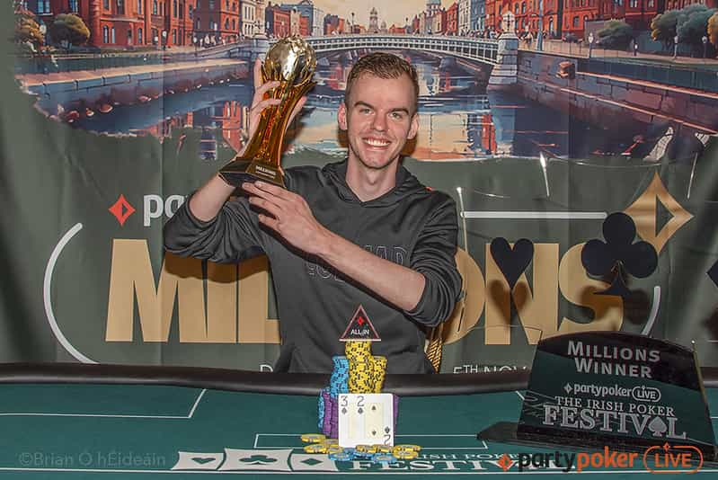 Michel Molenaar is all smiles with his Irish Poker Festival MILLIONS main event trophy at hand.